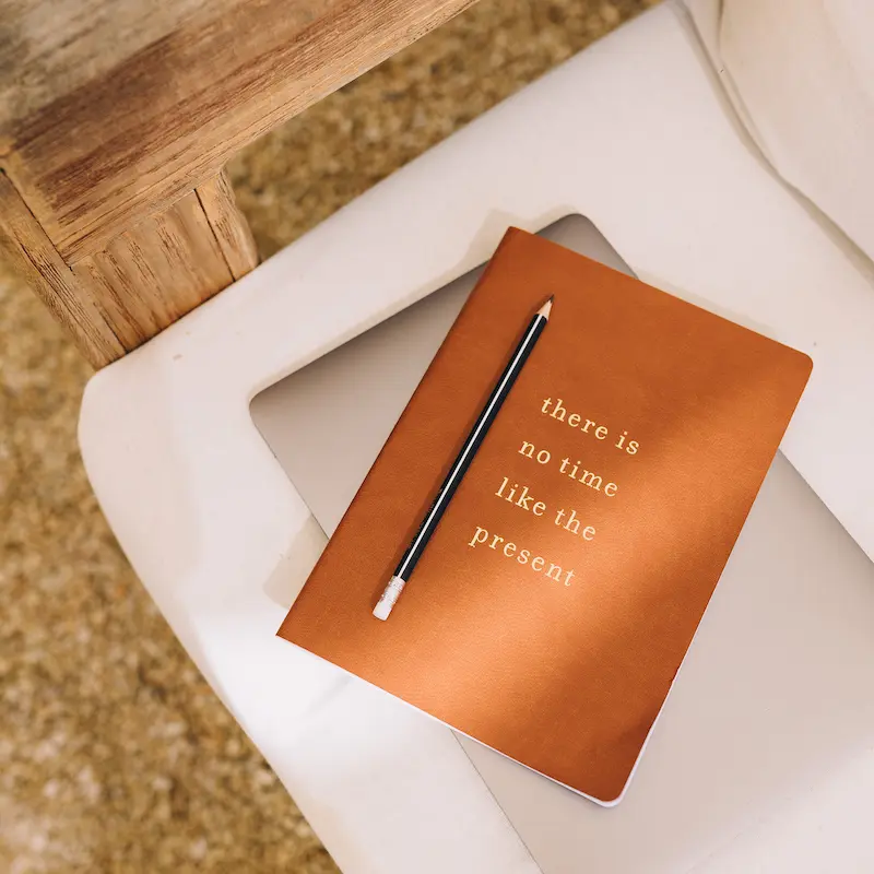 notebook and pen setup for blog flipping content planning