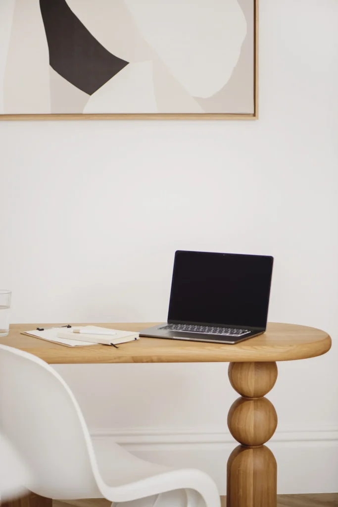 laptop on minimal desk representing strategic thinking and turning content into assets