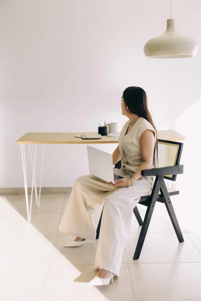 person sitting at a clean desk representing focus and clear direction