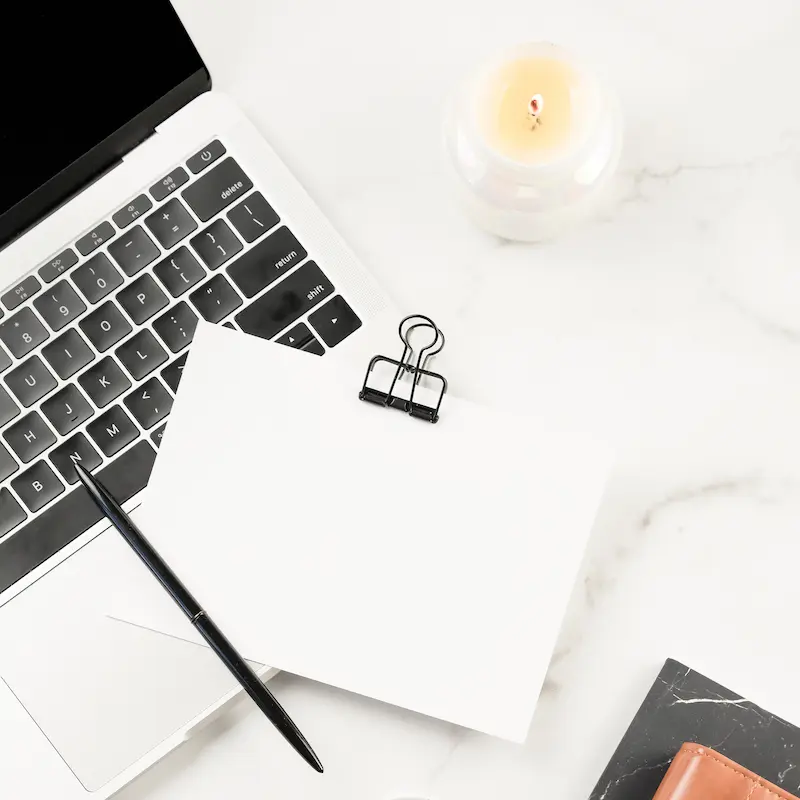 laptop and notebook workspace for managing website operations and workflow